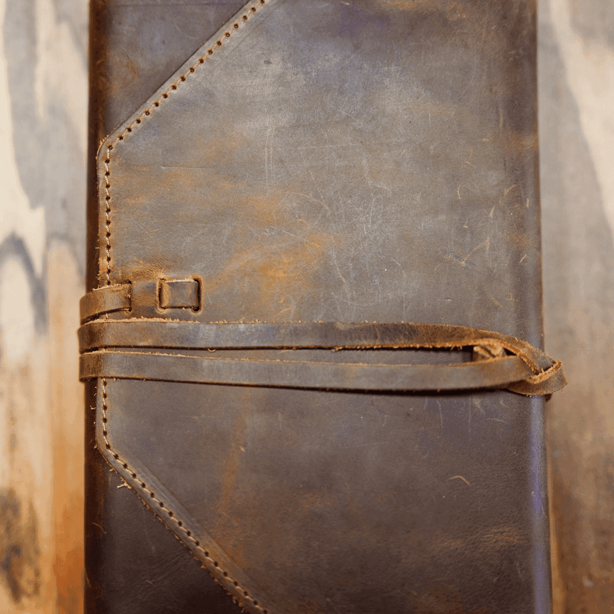 Rich leather binder with brass accents