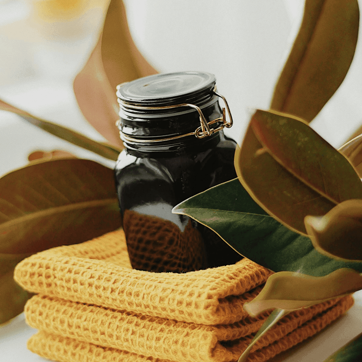 Self-care trio: candle, tonic, and balm